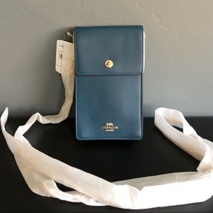 NEW. Coach Leather Snap Phone Crossbody.